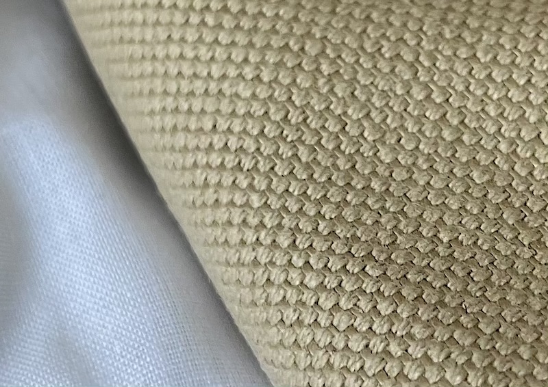 Ingrandimento trama cuscini in Linosa beige in pronta consegna.