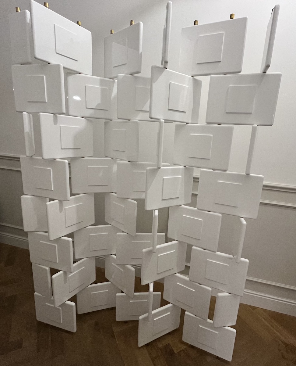 "Brick Screen" folding screen designed by Eileen Gray, in a white lacquered version.