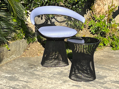 Outdoor Platner side chair and coffee table.